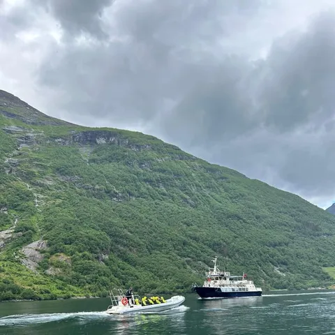 RIB boat speeding along the Geirangerfjord