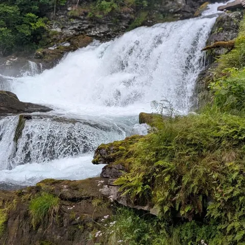 White water rushing over rocks through Geiranger village
